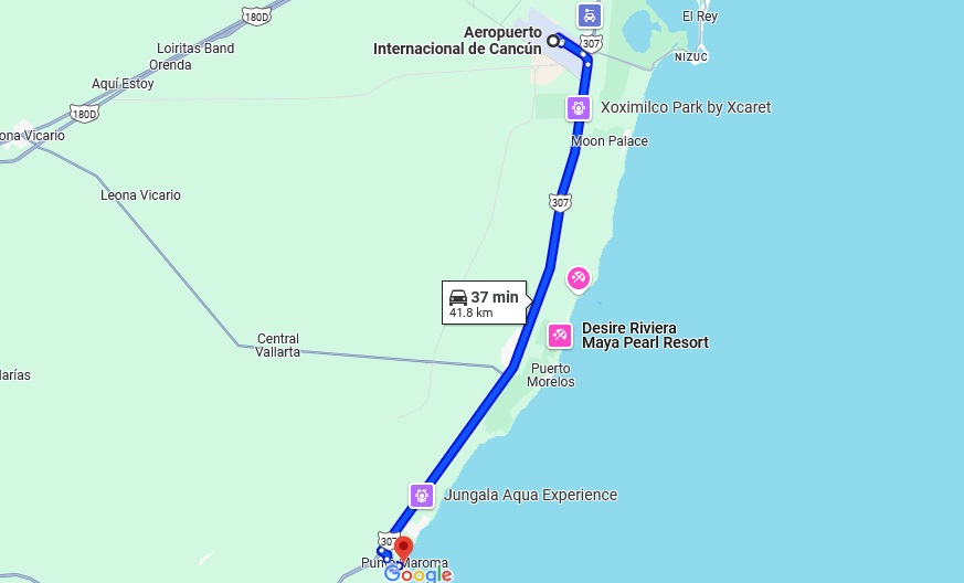 How far is Secrets Maroma from Cancun airport